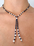 Navy blue and pearl lariat wire-wrapped necklace